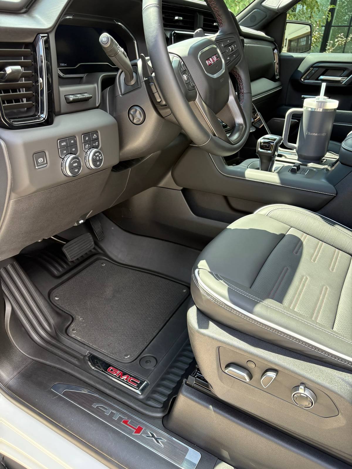 Clean, detailed truck interior — dashboard and steering wheel after an interior deep clean